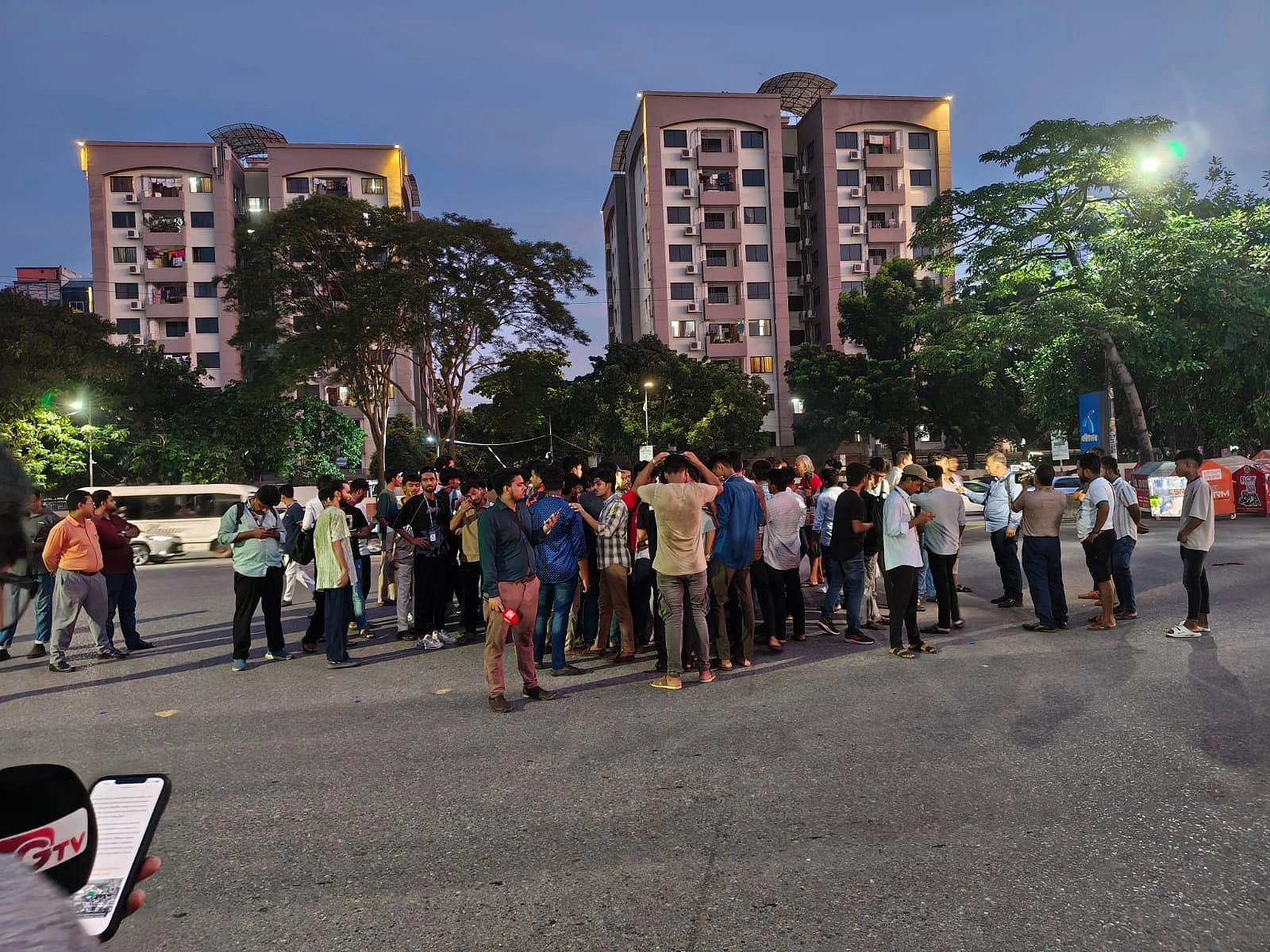 Protesters regroup after being dispersed.